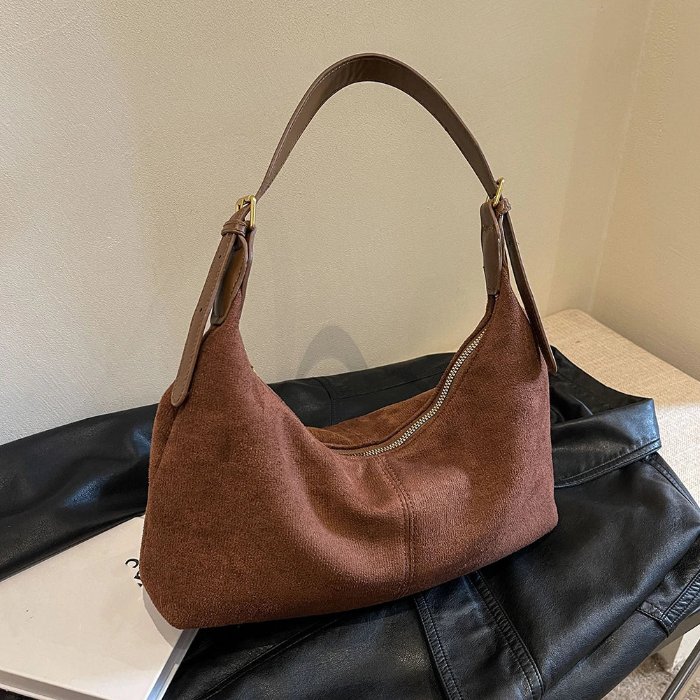 Suede crescent crossbody bag